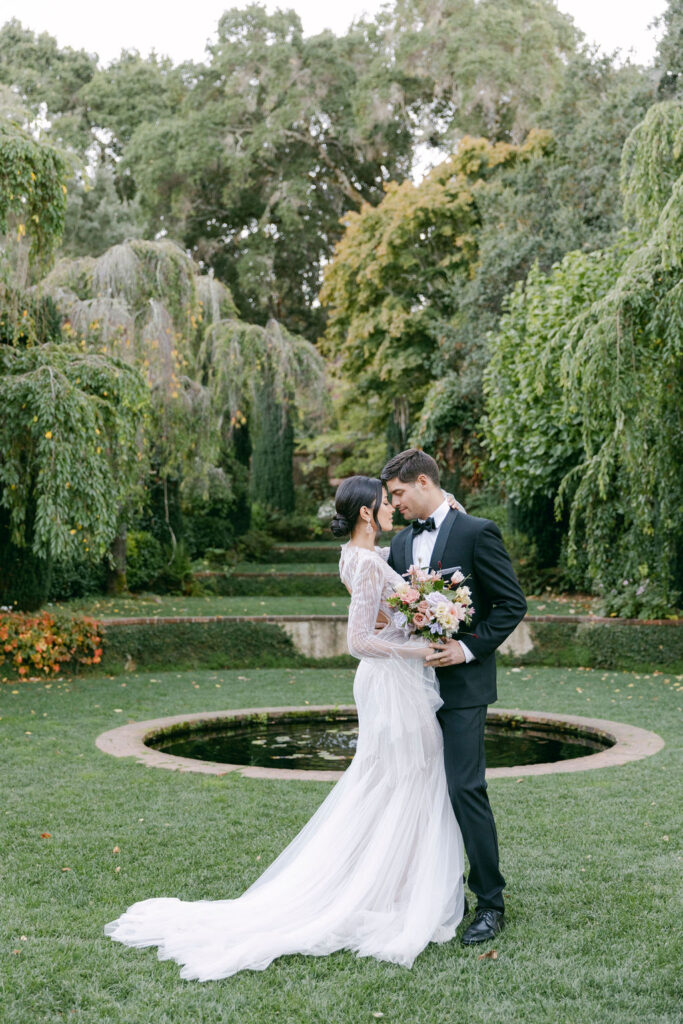 bride and groom looking at each other 