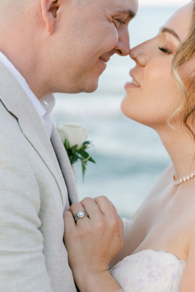 bride and groom looking at each other 