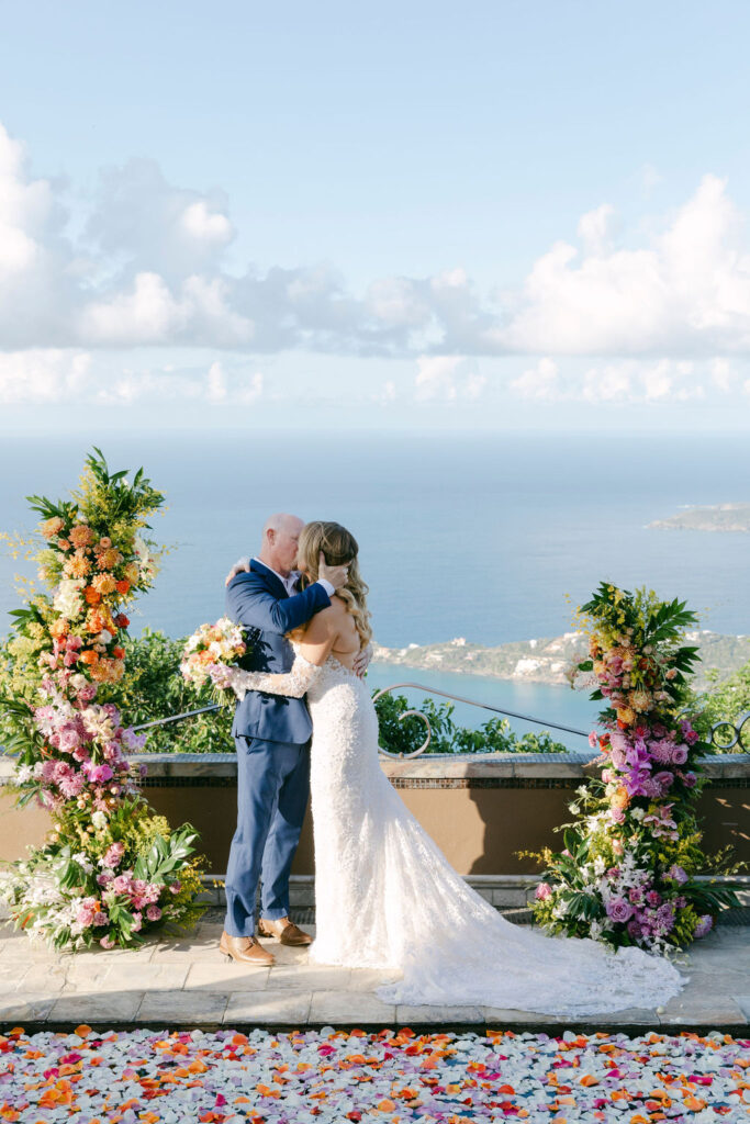 bride and groom kissing after their wedding ceremony 