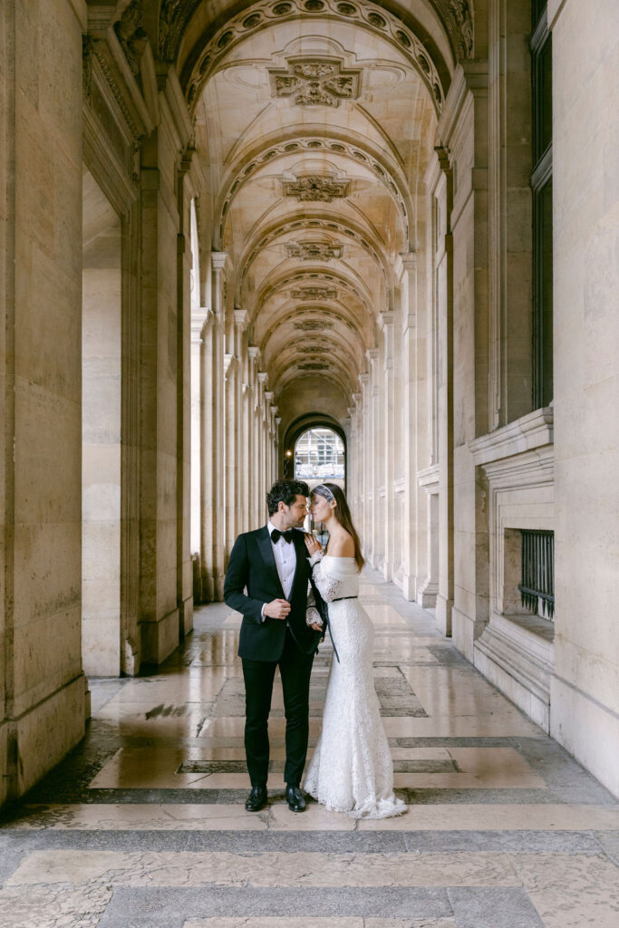 bride and groom walking around the streets of paris 