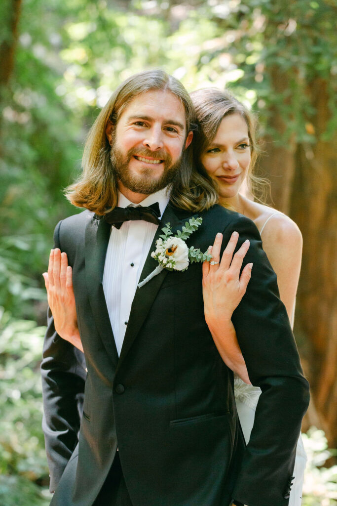 bride and groom hugging