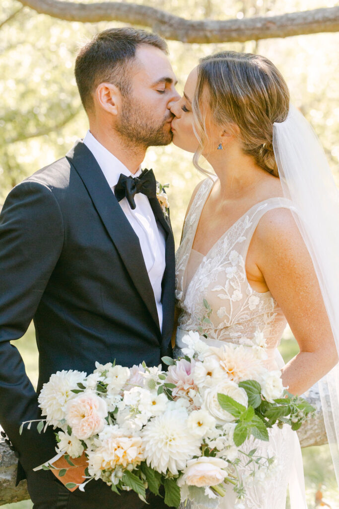 bride and groom kissing