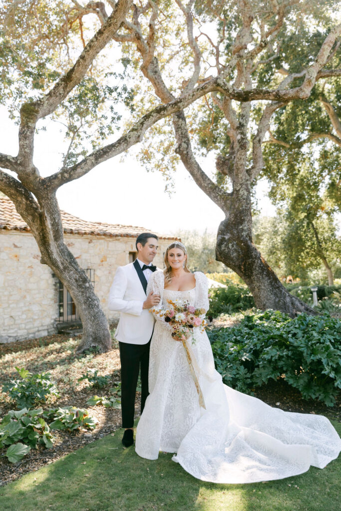 bride and groom hugging