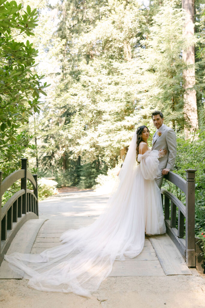 cute couple posing for the camera during their bridal photos