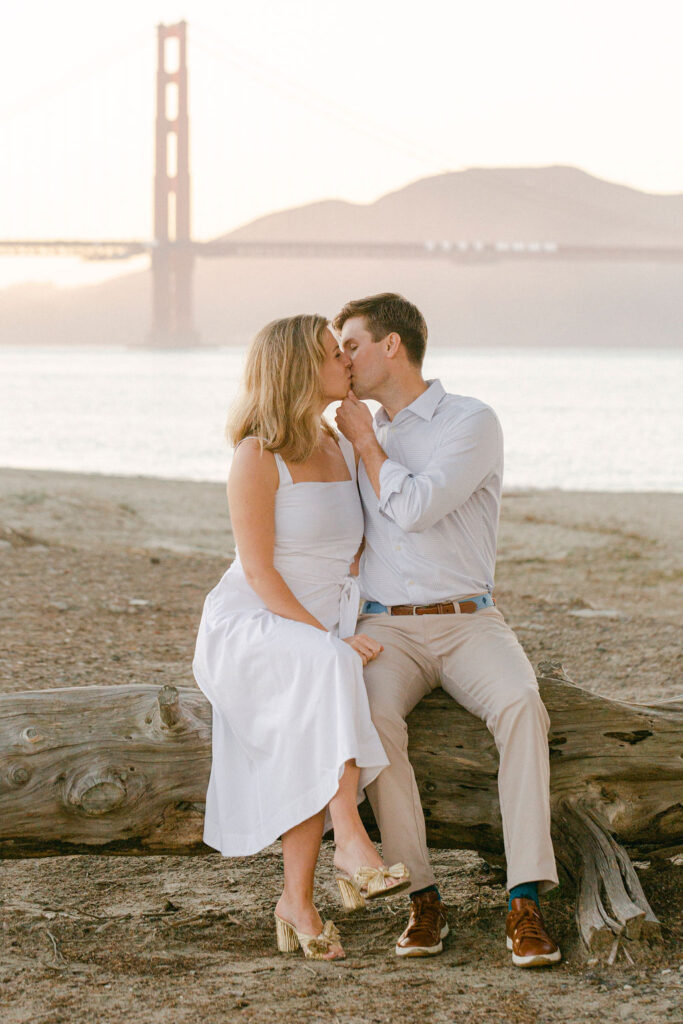 cute couple kissing during their photoshoot