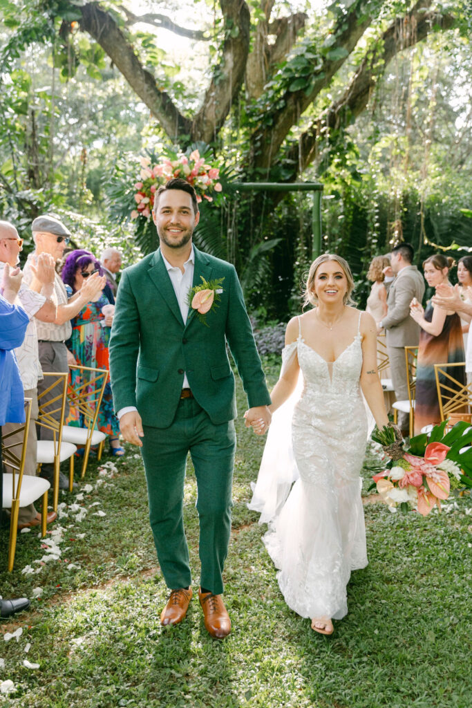 bride and groom heading to the wedding reception