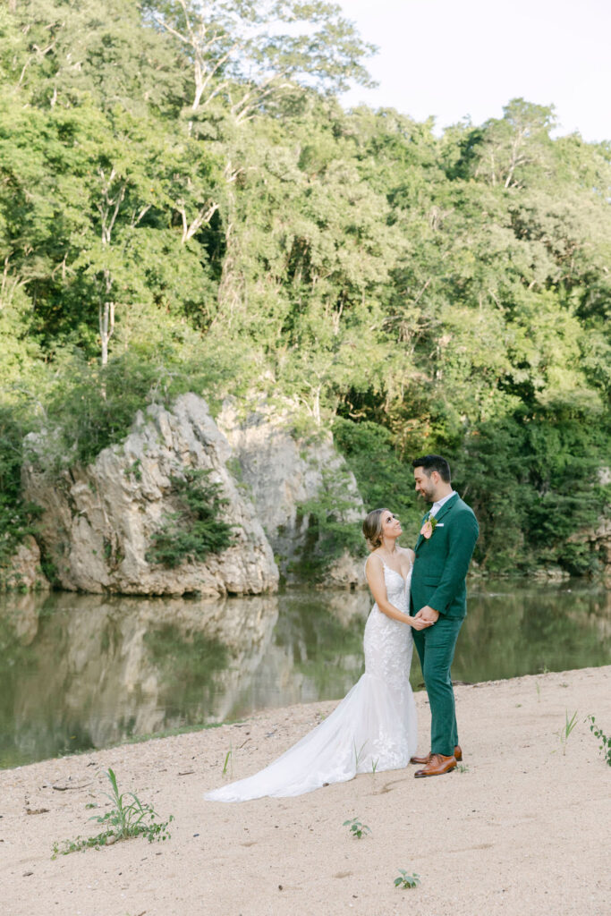 bride and groom looking at each other 