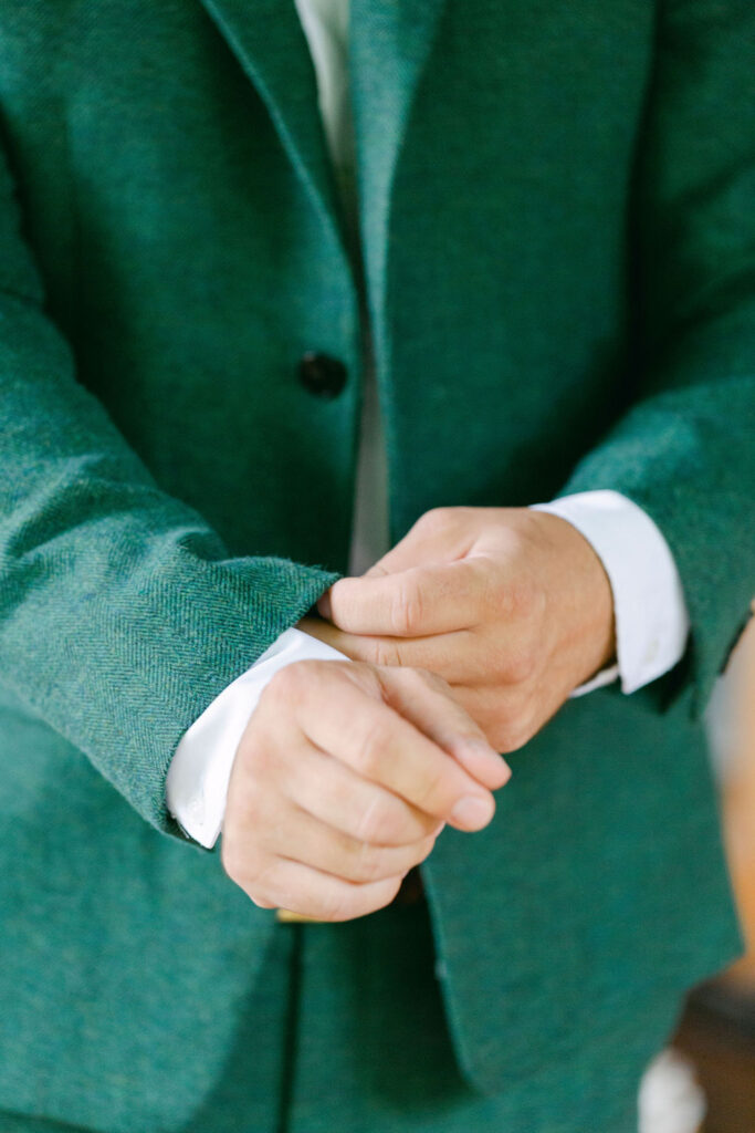 groom before his first look with the bride