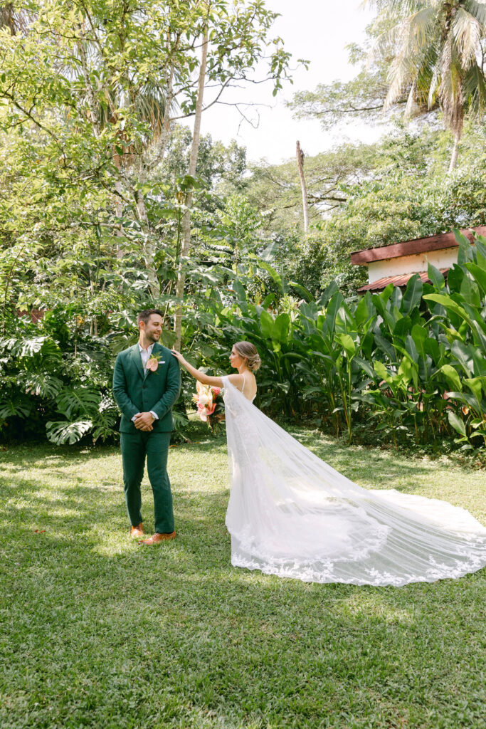 groom emotional seeing the bride on her wedding dress