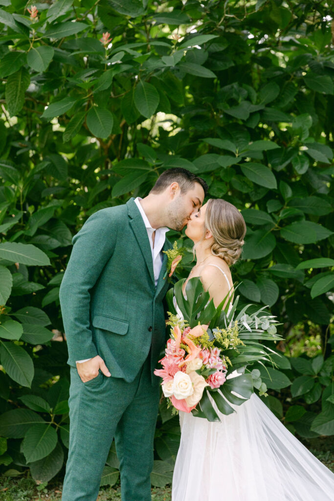 cute picture of the bride and groom kissing 