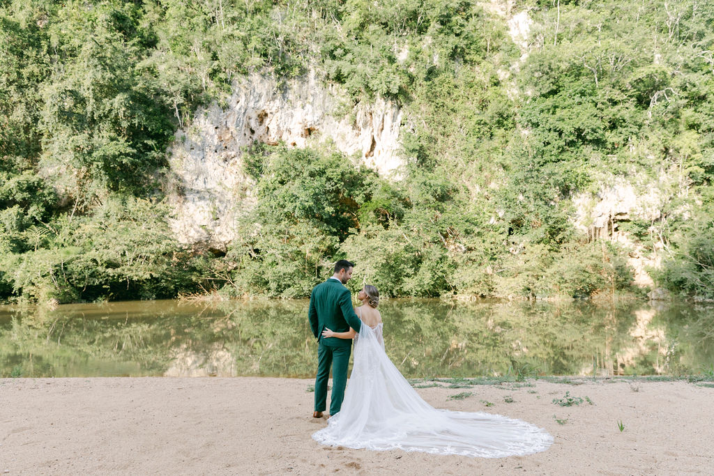 portrait of the bride and groom looking at each other 