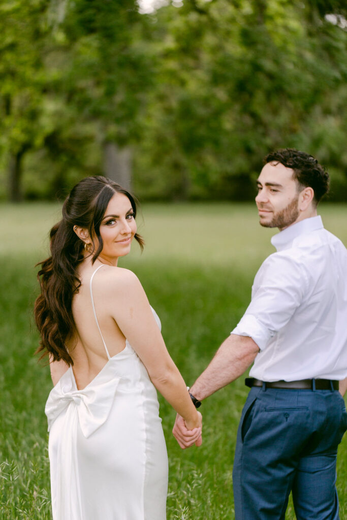 couple walking around their wedding venue 