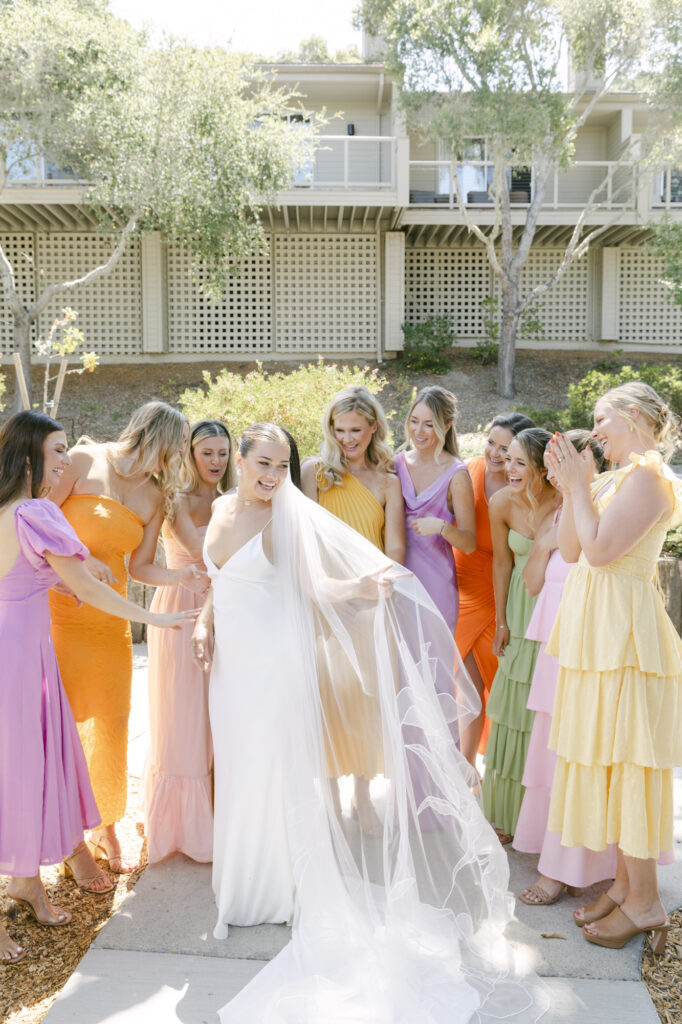 bride walking with bridesmaids at carmel wedding day