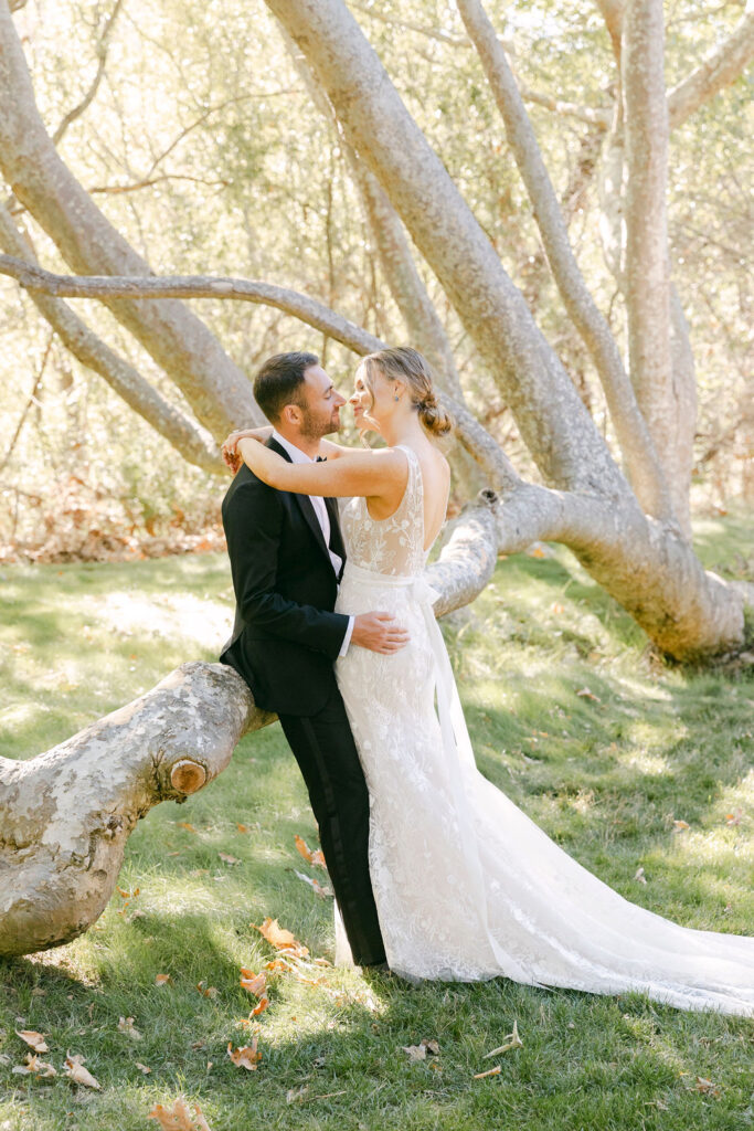 portrait of the newlyweds smiling at each other 