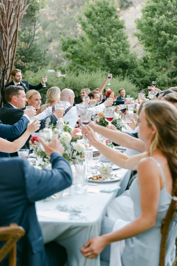 guests at the timeless summer wedding reception