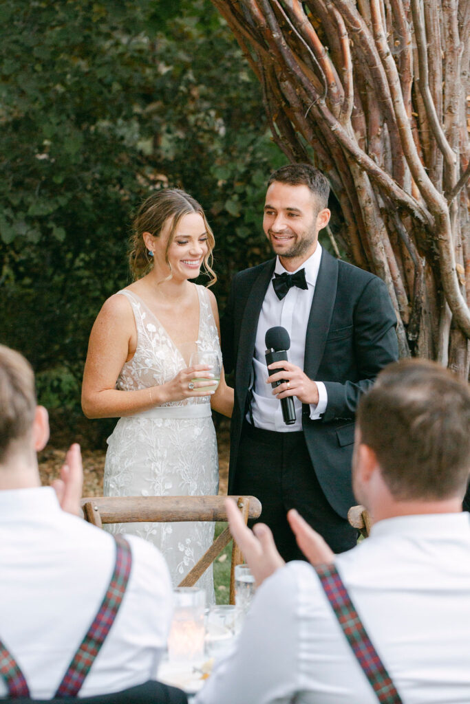 newlyweds giving their speech 