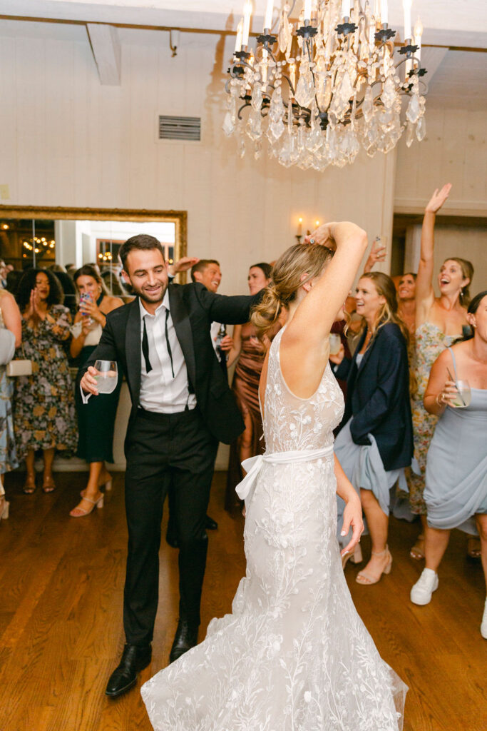 newly married couple dancing at their wedding reception party