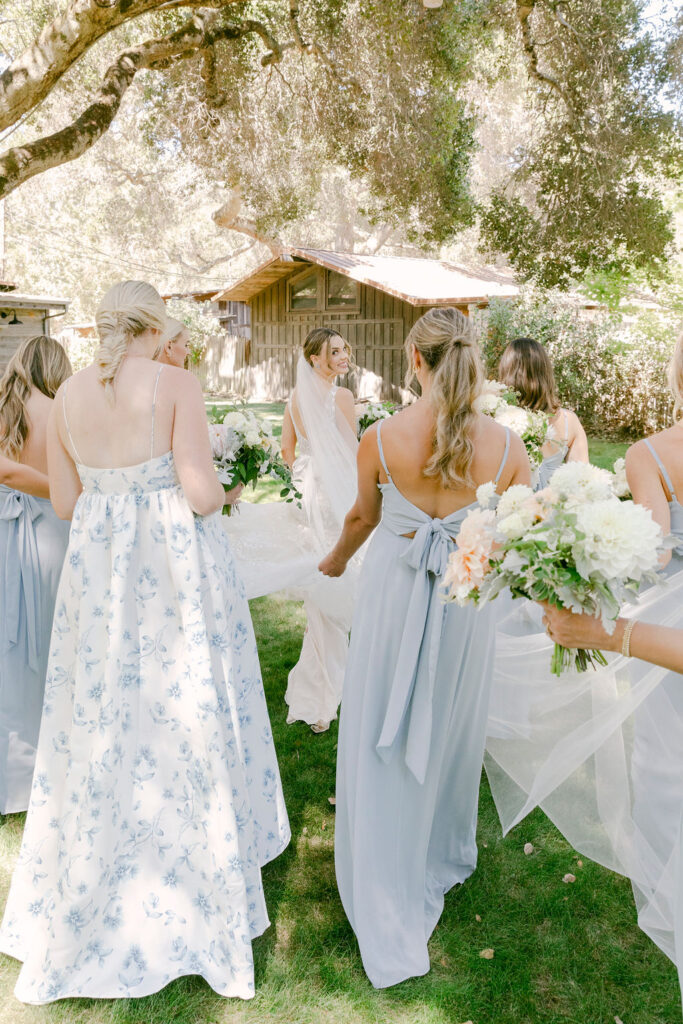 bride and her bridesmaids heading to the ceremony 