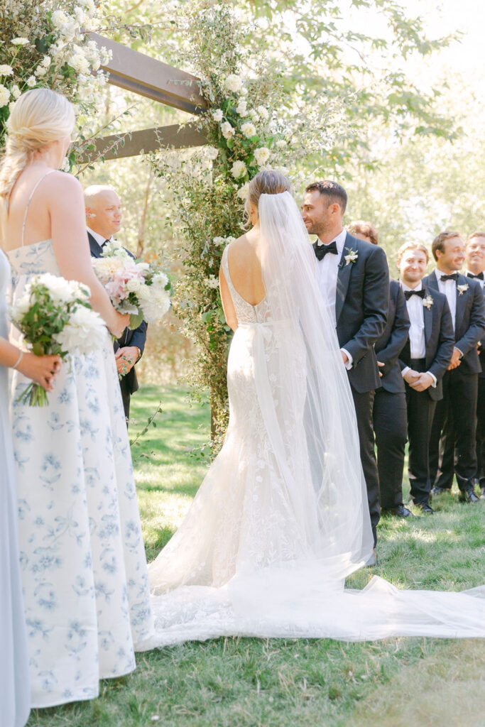 bride and groom at their dream timeless summer wedding ceremony 