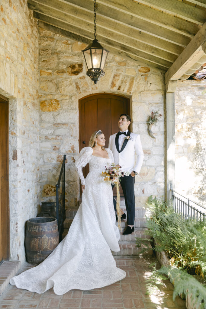 bride and groom standing next to each other during wedding photos in carmel